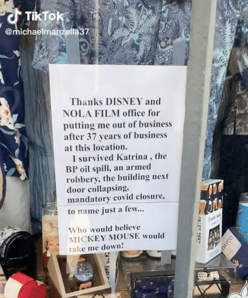 Tiktok video screenshot showing the Southern Cotton Company's sign explaining their closure due to Disney.